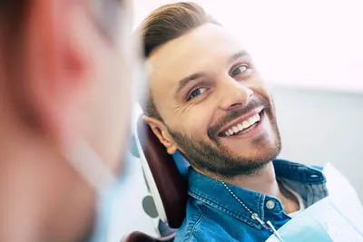 man smiling during his cosmetic dentistry appointment at Lee Dentistry